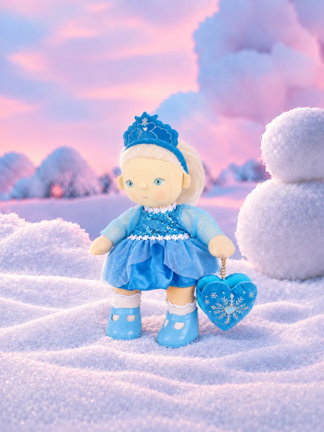 Olli Ella Dream Dinkum Doll Elsie Ice holding magnetic heart locket in snowy winter wonderland scene