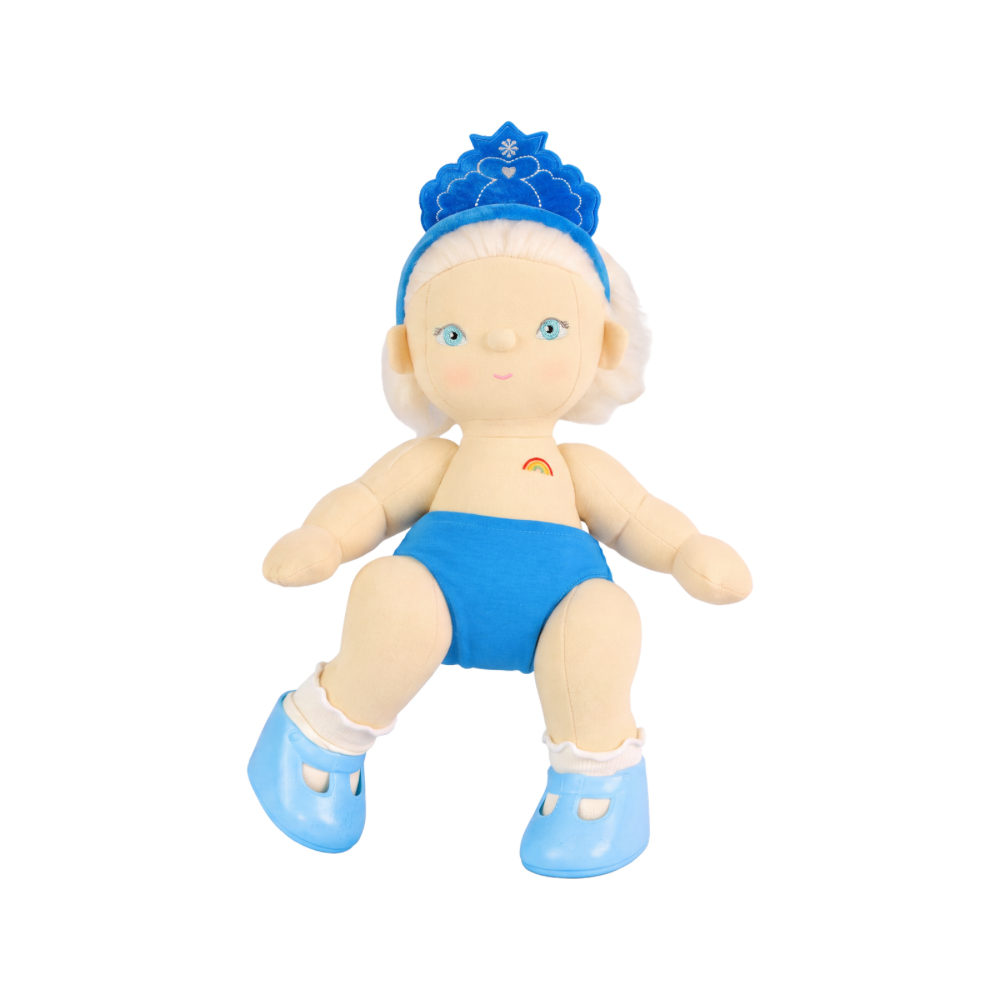 A soft plastic free doll with pale skin, white hair, blue knickers, blue crown, and blue shoes, shown against a plain white background.