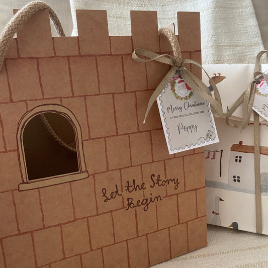 Maileg Castle Gift Bag: A charming Christmas gift wrapping option with personalised tag and ribbon.